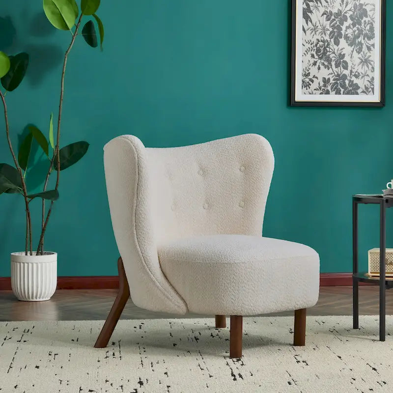 Moderne beklede armloze accentstoel met zachte zitting en frame van massief hout