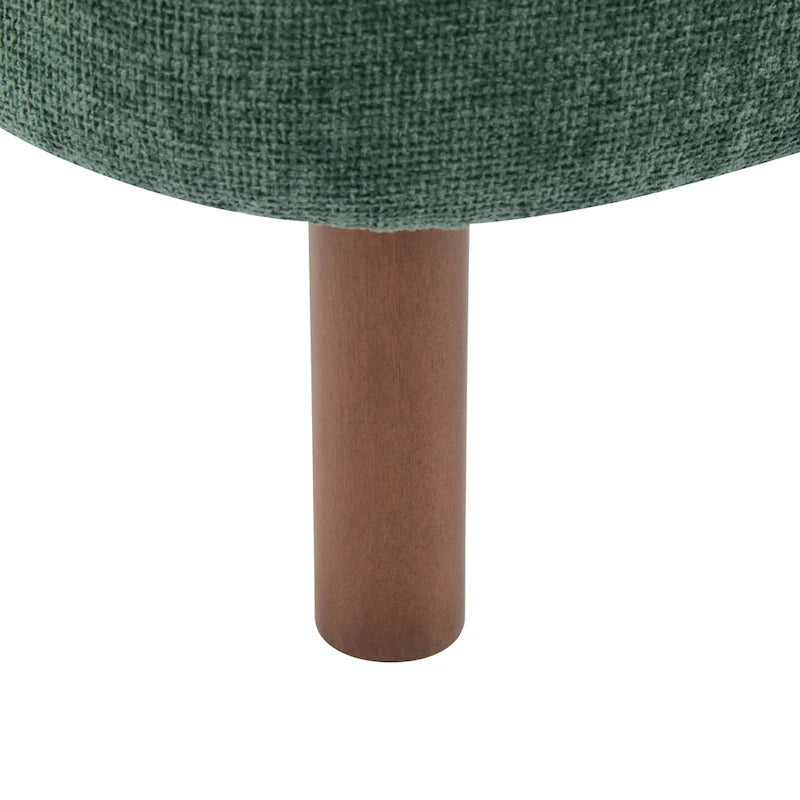 Moderne beklede armloze accentstoel met zachte zitting en frame van massief hout